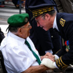 France, Toulouse, 2018-07-14. a senior officer talking with a green beret retired during the celebration of the 14 of ju