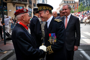 France, Toulouse, 2018-07-14. a senior officer talking with a red beret retired during the celebration of the 14 of july