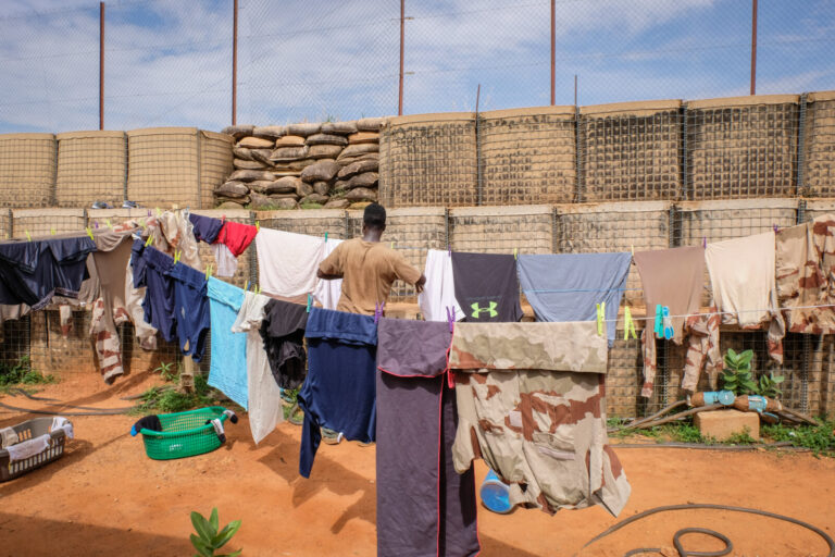 Niger, Niamey, 2018-08-22. People make laundry inside military base. Photograph by Fred MARIE / Defense Zone. Niger, Nia