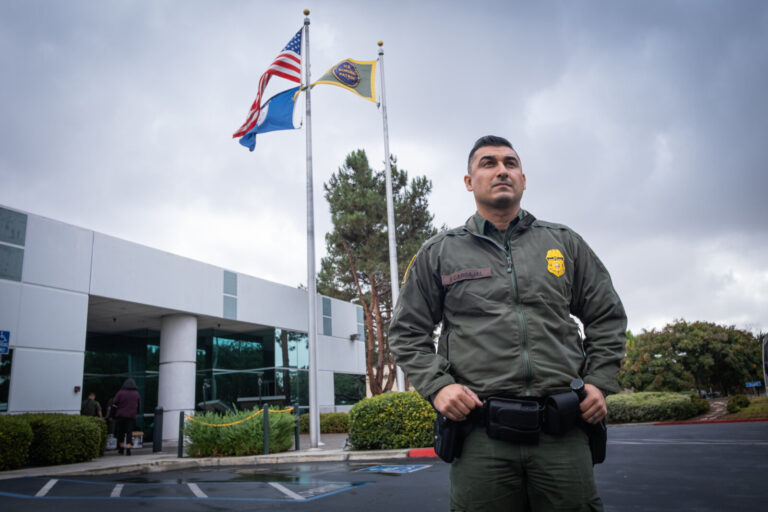 USA, San Diego, 2019-11-20. Border Patrol agent patrols along a section of the U.S.-Mexico border fence. Photograph by F