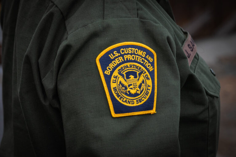 USA, San Diego, 2019-11-20. Border Patrol agent patrols along a section of the U.S.-Mexico border fence. Photograph by F