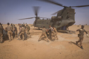 Burkina Faso, april 2021. French soldier load british chinook helicoptere during operation barkhane, french military war