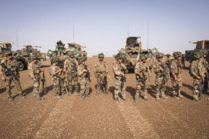 Burkina Faso, april 2021. French army soldiers shoot with guns into Sahel desert during barkhane operation.
Burkina Faso
