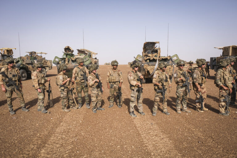 Burkina Faso, april 2021. French army soldiers shoot with guns into Sahel desert during barkhane operation.Burkina Faso