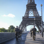 France, Parie, 2024-06-15. Soldiers from the 1er RIMa patrol near the Eiffel Tower as part of the Sentinelle mission and