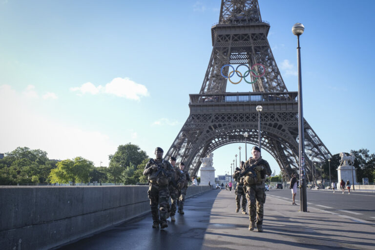 France, Parie, 2024-06-15. Soldiers from the 1er RIMa patrol near the Eiffel Tower as part of the Sentinelle mission and