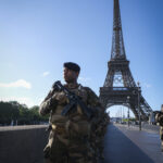 France, Parie, 2024-06-15. Soldiers from the 1er RIMa patrol near the Eiffel Tower as part of the Sentinelle mission and