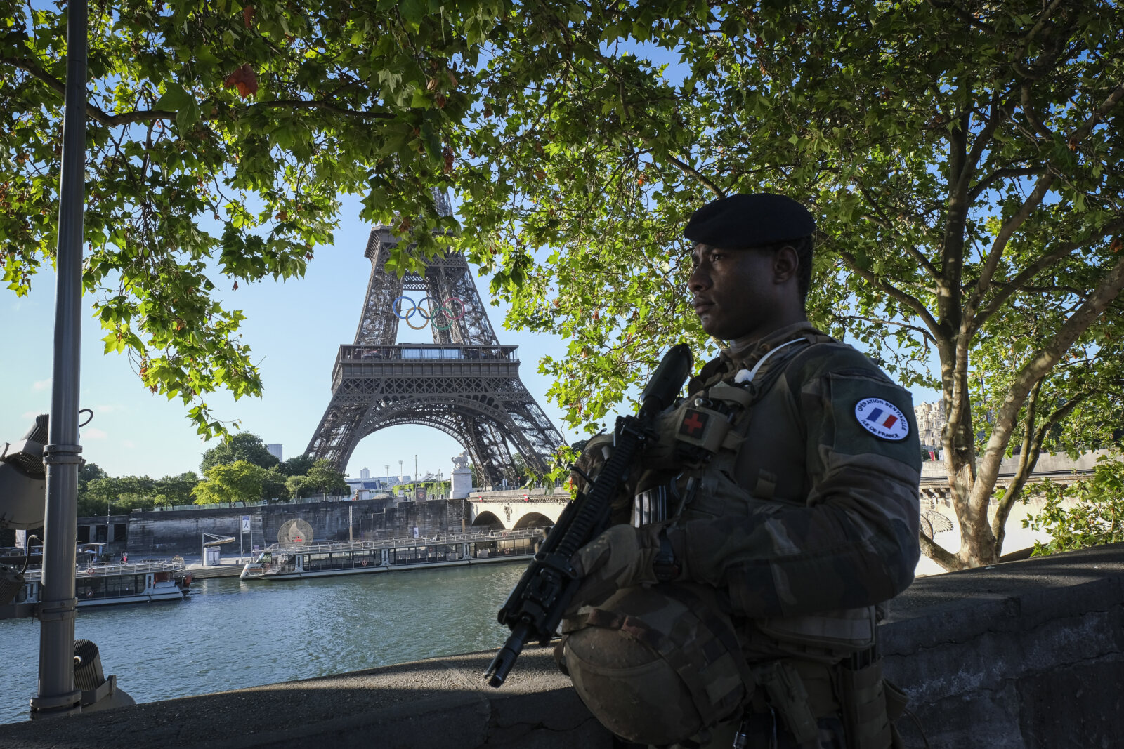 France, Parie, 2024-06-15. Soldiers from the 1er RIMa patrol near the Eiffel Tower as part of the Sentinelle mission and