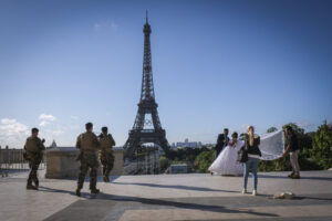 France, Parie, 2024-06-15. Soldiers from the 1er RIMa patrol near the Eiffel Tower as part of the Sentinelle mission and
