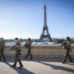 France, Parie, 2024-06-15. Soldiers from the 1er RIMa patrol near the Eiffel Tower as part of the Sentinelle mission and