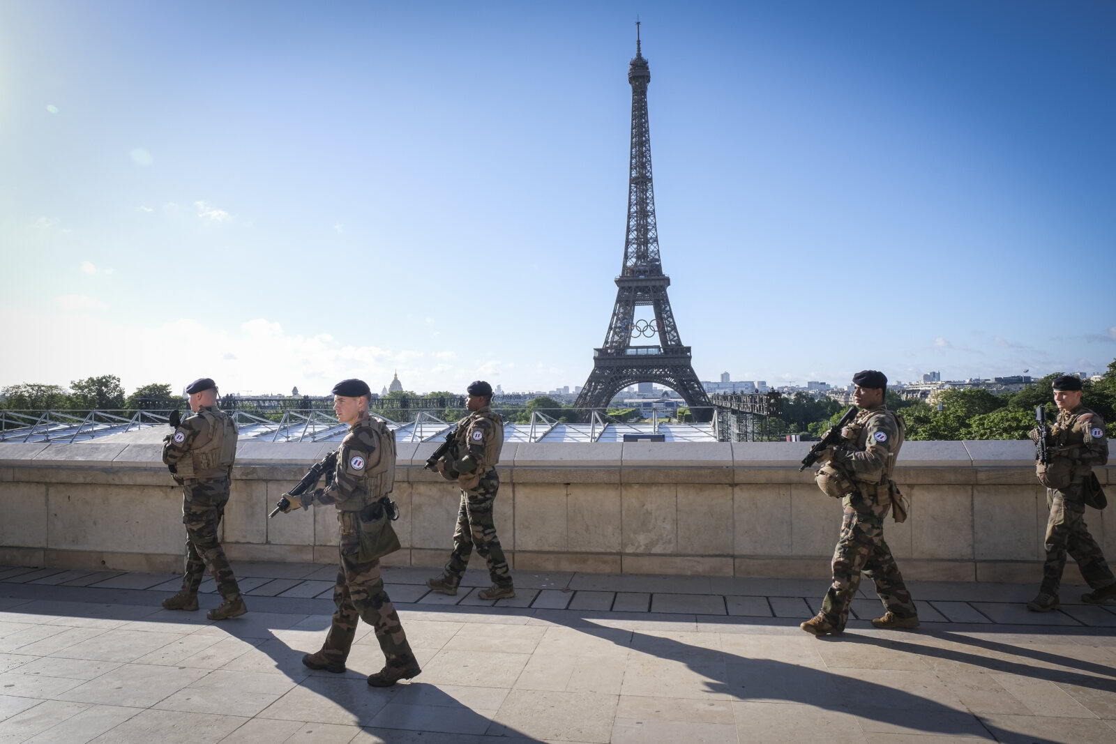 France, Parie, 2024-06-15. Soldiers from the 1er RIMa patrol near the Eiffel Tower as part of the Sentinelle mission and