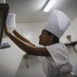 French Polynesia, Papeete, 2019-10-29. Portrait of Blanche, young Tahitian 22 years old and apprentice pastry chef in th