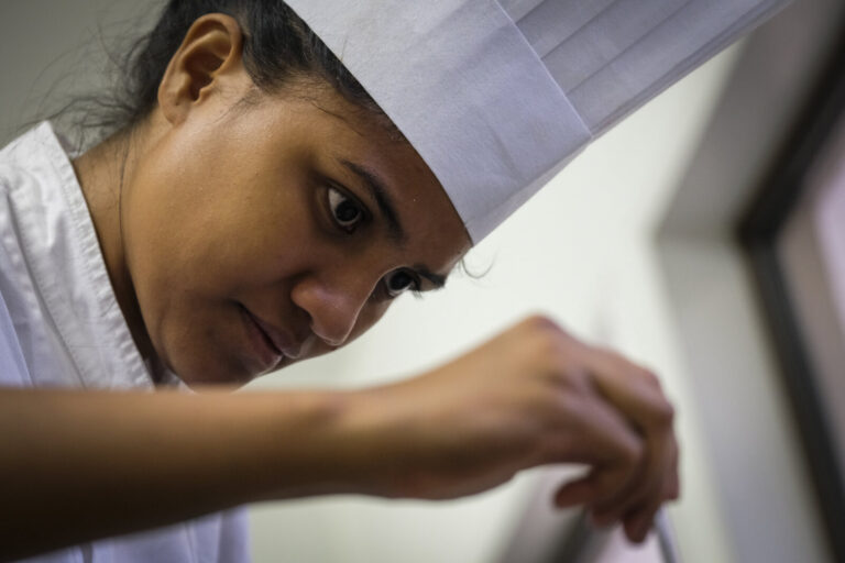 French Polynesia, Papeete, 2019-10-29. Portrait of Blanche, young Tahitian 22 years old and apprentice pastry chef in th