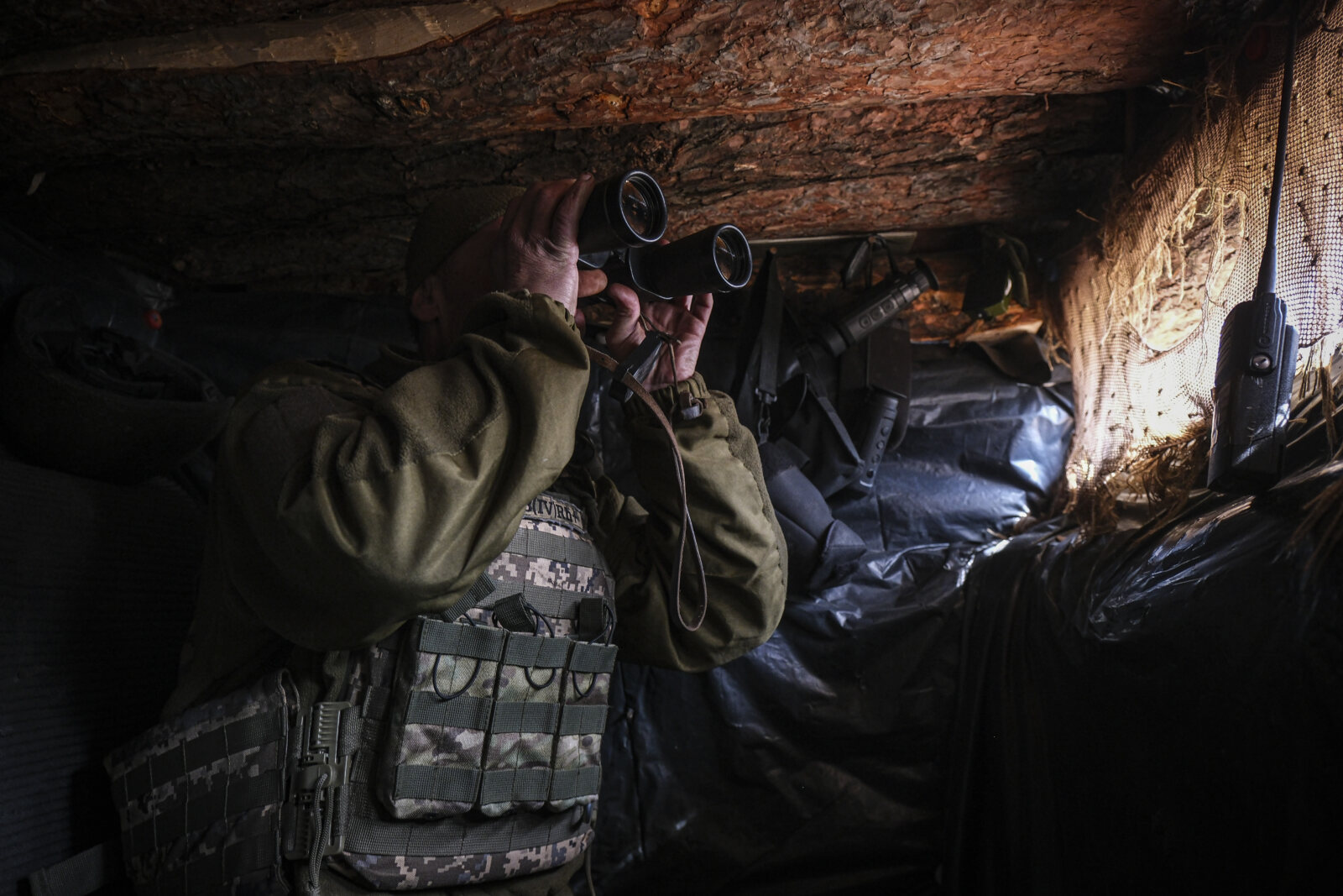 Ukraine, Tchassiv Yar, 2023-03-23. Ukrainian soldiers from tank brigade inside trench at 500 meters from russian forces.