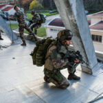 France, Toulouse, 2017-11-30. On operation Sentinelle, legionnaires of the 2nd Foreign Parachute Regiment patrol the str