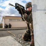 France, Toulouse, 2017-11-30. On operation Sentinelle, legionnaires of the 2nd Foreign Parachute Regiment patrol the str