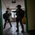 France, Toulouse, 2017-11-30. On operation Sentinelle, legionnaires of the 2nd Foreign Parachute Regiment patrol the str