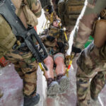 France, Toulouse, 2017-11-30. On operation Sentinelle, legionnaires of the 2nd Foreign Parachute Regiment patrol the str