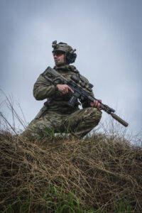 France, Bayonne, 2024-03-29. A former French special forces soldier turned instructor works through shooting positions a