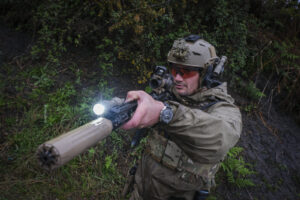 France, Bayonne, 2024-03-29. A former French special forces soldier turned instructor works through shooting positions a