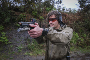 France, Bayonne, 2024-03-29. A former French special forces soldier turned instructor works through shooting positions a