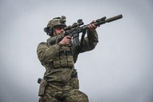 France, Bayonne, 2024-03-29. A former French special forces soldier turned instructor works through shooting positions a