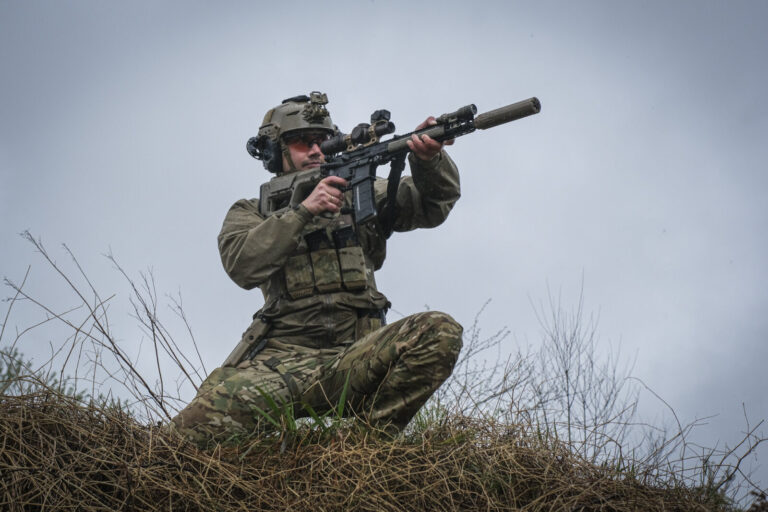 France, Bayonne, 2024-03-29. A former French special forces soldier turned instructor works through shooting positions a