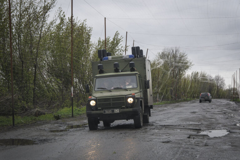 Ukraine, Pavlograd, 2026-04-24. Kilometres of netting strung on poles turn the supply roads of the Ukrainian rear into c
