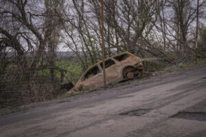 Ukraine, Pavlograd, 2026-04-24. Kilometres of netting strung on poles turn the supply roads of the Ukrainian rear into c