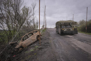 Ukraine, Pavlograd, 2026-04-24. Kilometres of netting strung on poles turn the supply roads of the Ukrainian rear into c