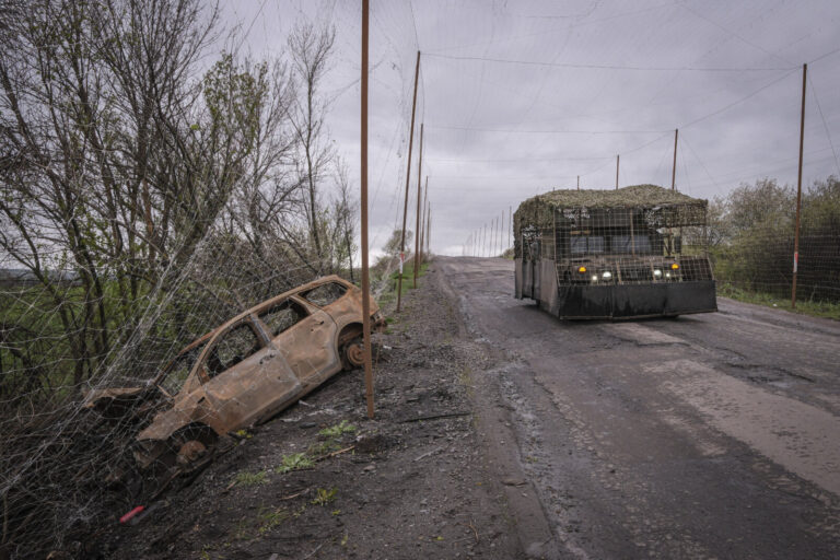 Ukraine, Pavlograd, 2026-04-24. Kilometres of netting strung on poles turn the supply roads of the Ukrainian rear into c