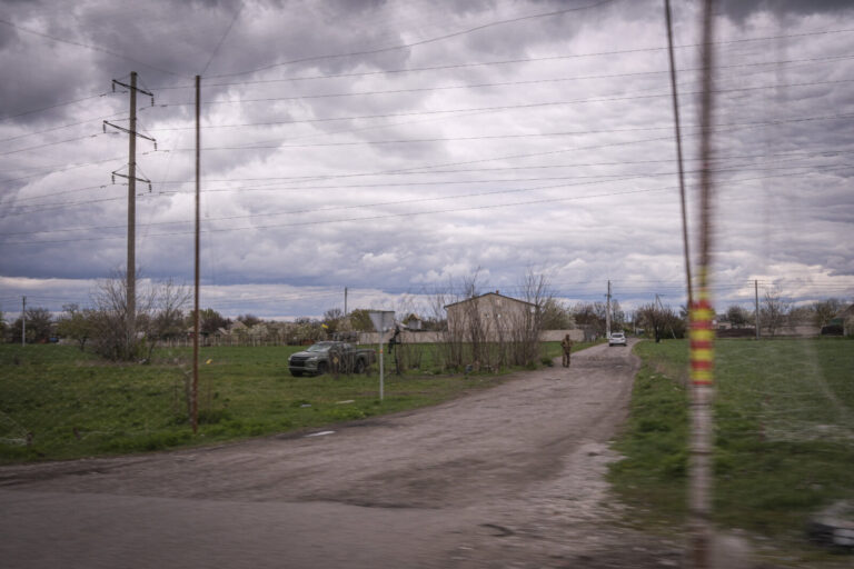 Ukraine, Pavlograd, 2026-04-24. Kilometres of netting strung on poles turn the supply roads of the Ukrainian rear into c